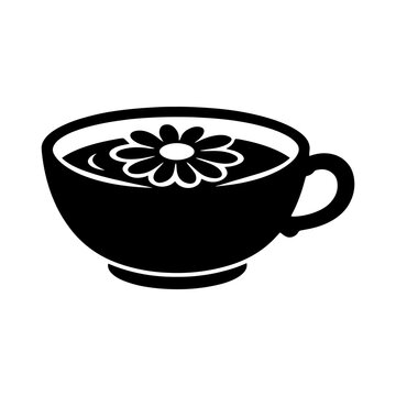 Black silhouette of a teacup with a floral design on a white background