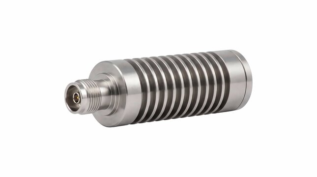 Polished stainless steel coaxial rf attenuator component featuring a threaded connector end and cooling fins for industrial electronic signal applications