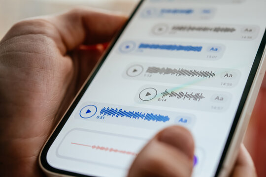 A person recording voice messages in a messenger.