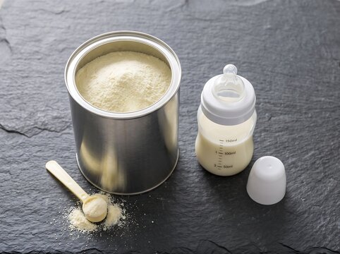Baby Formula Powder With Bottle And Spoon