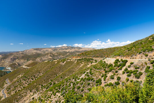 Scenic view of chaparral mountains and winding road in Mariposa County California USA