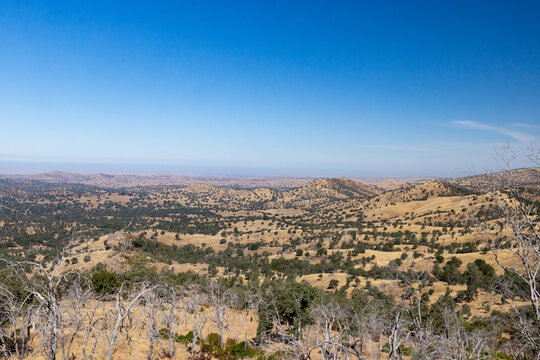 Wide landscape view of dry California foothills along State Route 49 in Mariposa County