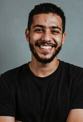 Fototapeta premium Authentic happiness and genuine smile, young man with beard laughing cheerfully, positive emotion and well being