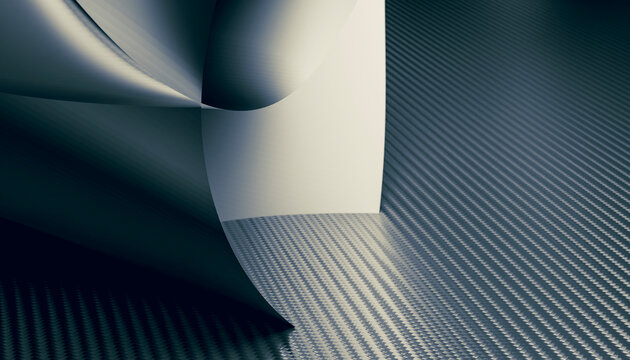 A curved stainless steel sheet on a textured metal surface