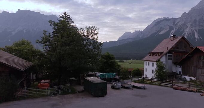 Drone flight over Lermoos and Ehrwald with Zugspitze mountain view