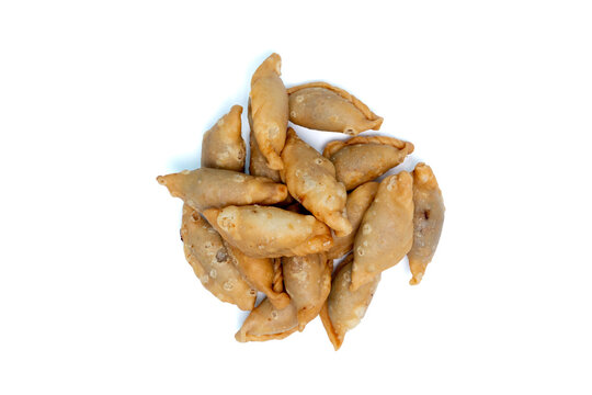 Fried Thai Fish Puff or Pansib with fish filling on isolated white background.