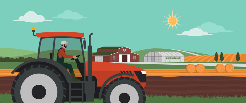 Farmer driving a tractor in the fields