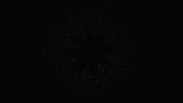 A subtle star shape faintly visible against a dark textured grainy background