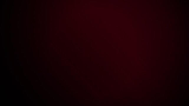A deep and moody solid dark red background with subtle light gradients