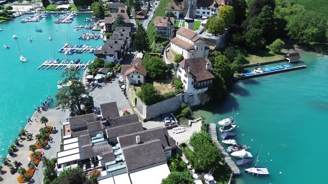 Aerial Drone View of Spiez Harbor and Historic Waterfront on Lake Thun, Switzerland