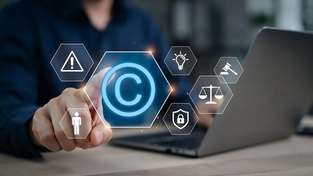 Businessman touching glowing copyright icon on virtual screen, symbolizing digital rights management and intellectual property protection