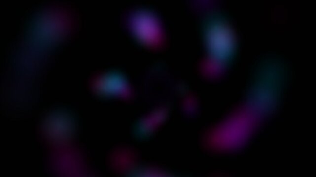 Abstract background featuring soft glowing blue and purple light patches