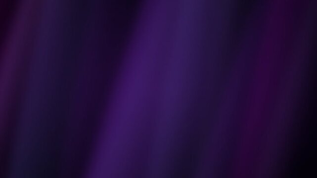 A smooth and moody abstract background with deep violet and purple gradients
