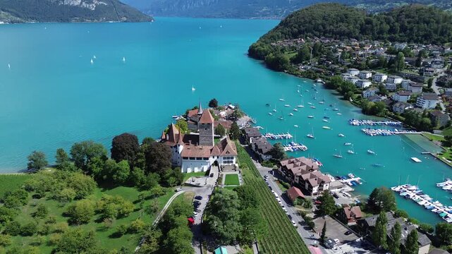 Spiez Castle and turquoise Lake Thun, Switzerland