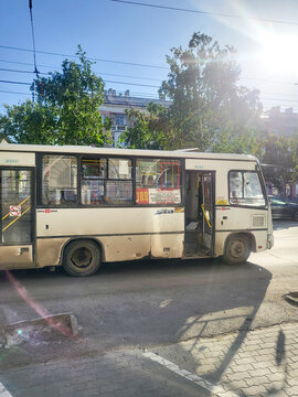 White PAZ-3205 minibus (marshrutka) on route 109 at a bus stop in Barnaul, a Russian public transport bus, Altai Region, Russia 25.05.2025