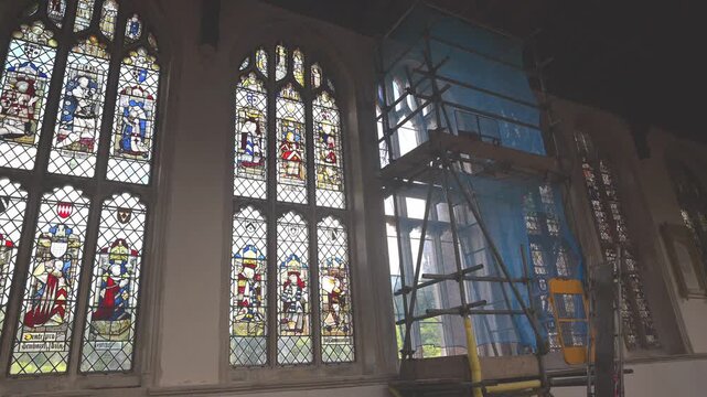 Medieval stained glass restoration in Holy Trinity Church, Melford.