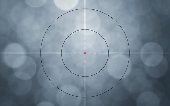 Sniper scope reticle overlay with a glowing red center dot positioned against a soft grey circular bokeh light pattern background