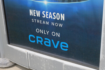 Naklejka premium Astral out-of-home transit shelter with advertising poster for Crave, a Canadian owned streaming service in Toronto