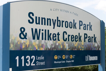 Naklejka premium close-up of City of Toronto Sunnybrook Park & Wilket Creek Park sign, located at 1132 Leslie St (Don River watershed)