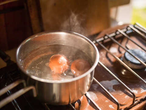 boiling eggs in a stainless casserole