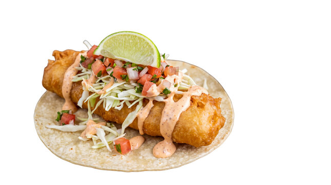 Crispy fish taco with lime and chipotle sauce. Fried seafood taco on corn tortilla. Mexican street food with cabbage slaw and pico de gallo.