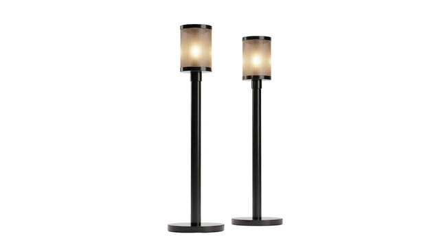 Two tall slim table lamps with cylindrical mesh shades and glowing warm light bulbs isolated on a transparent background