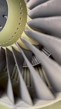 Jet blade engine move slowly at Airport.