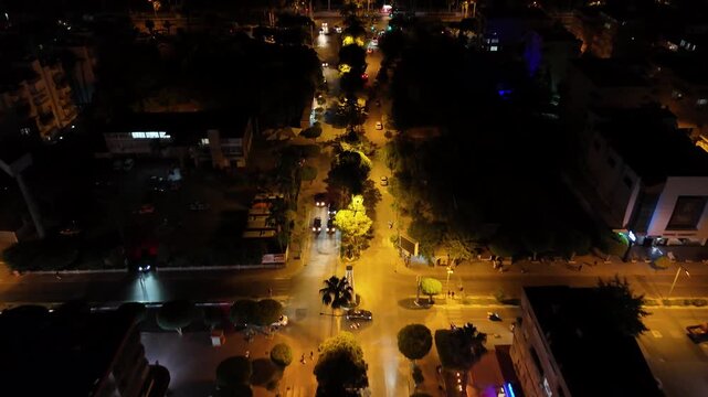Aerial drone view of Alanya, Turkey at night, featuring the illuminated Mediterranean coastline, city lights, beachfront, urban landscape and night resort atmosphere.
Night aerial view of Alanya on th