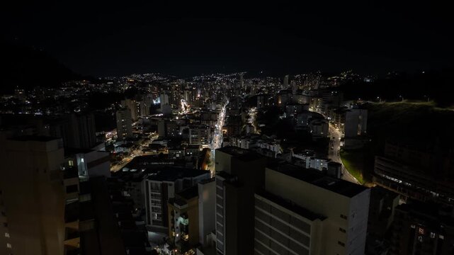 Night Traffic Flow Between High Rises in Juiz de Fora
