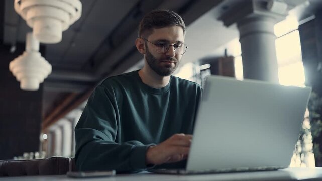 IT Professional Writing Program Code, Portrait Of Freelancer Working With Laptop In Cafe