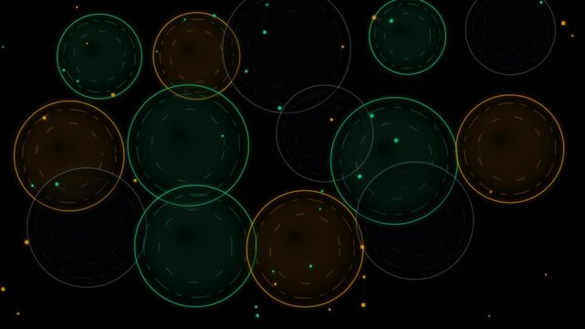 Abstract decorative circles with bokeh effect. Glowing rings in green and gold on black background. Shiny confetti particles. Overlapping geometric discs. Festive holiday motion graphic