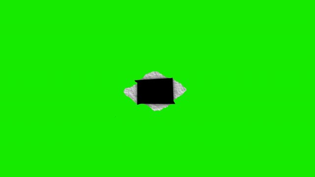 Torn paper stop motion rectangle features a green screen background and an alpha channel, making it ideal for video editing projects, presentations, and digital design.