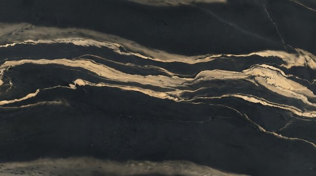 Black marble surface with flowing gold veins and natural stone texture patterns