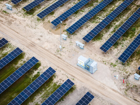 Aerial view of Tume Solar Energy Park with rows of photovoltaic panels and electrical infrastructure in Tukums Municipality, Latvia.