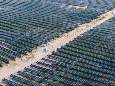 Aerial view of Tume Solar Energy Park featuring rows of solar panels across a large site in Tukums Municipality, Latvia.