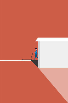 Focused businessman pushes an empty flatbed trolley out a large white building, representing logistics, supply chain, and business operations