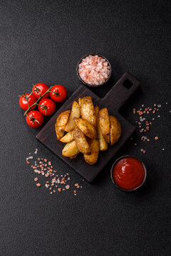 Fried potato wedges seasoned with salt and spices, ready for dinner table. Fried potato wedges