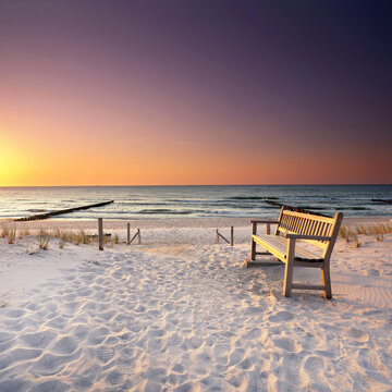 Empty Beach Bench at Sunset on the Baltic Sea Coast