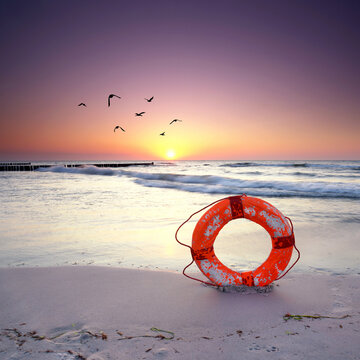 Serene Autumn Beach with Lifesaver by the Baltic Sea
