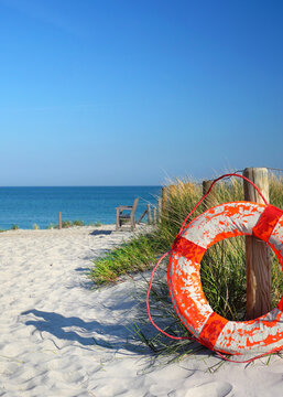 lifebuoy on the beach at Baltic Sea in daylight