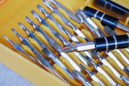 Selectively focus on a few small, interchangeable screwdriver bits suited to your needs.