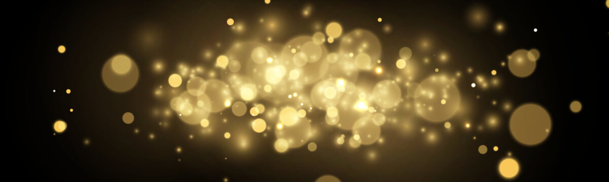 A cluster of soft golden bokeh lights glimmers against a dark background. The lights vary in size with gentle halos and a glowing intensity. This sparkling effect creates a festive and.