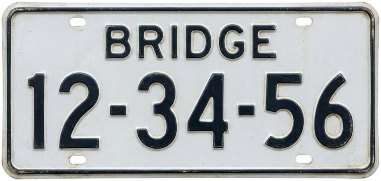 Vintage style vehicle license plate with custom text.
