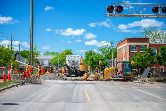railway construction in Canada, building the renewal of a level crossing, upgrading from a single line to twin track