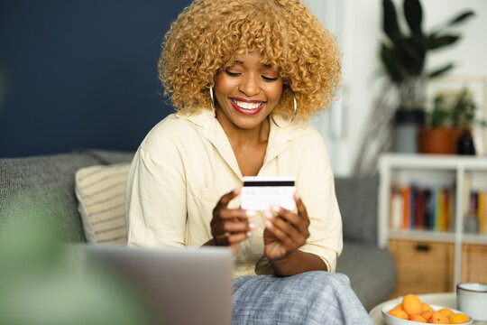 Cheerful Woman Shopping Online With Credit Card 