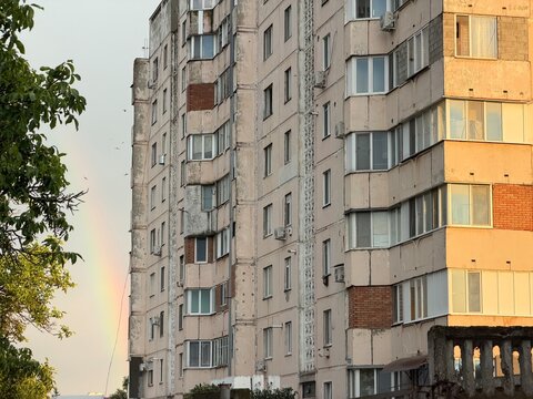 Rainbow over a Soviet-era Apartment Block in Slobozia, Transnistria, Moldova