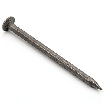 single long iron nail lying flat