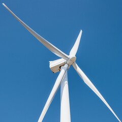 wind turbine on blue sky © Ryan