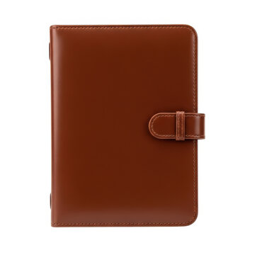 Brown leather notebook with closure isolated on white background