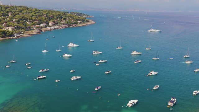 Boats on the bay in blue water drone video Cote d'Azur France 4K